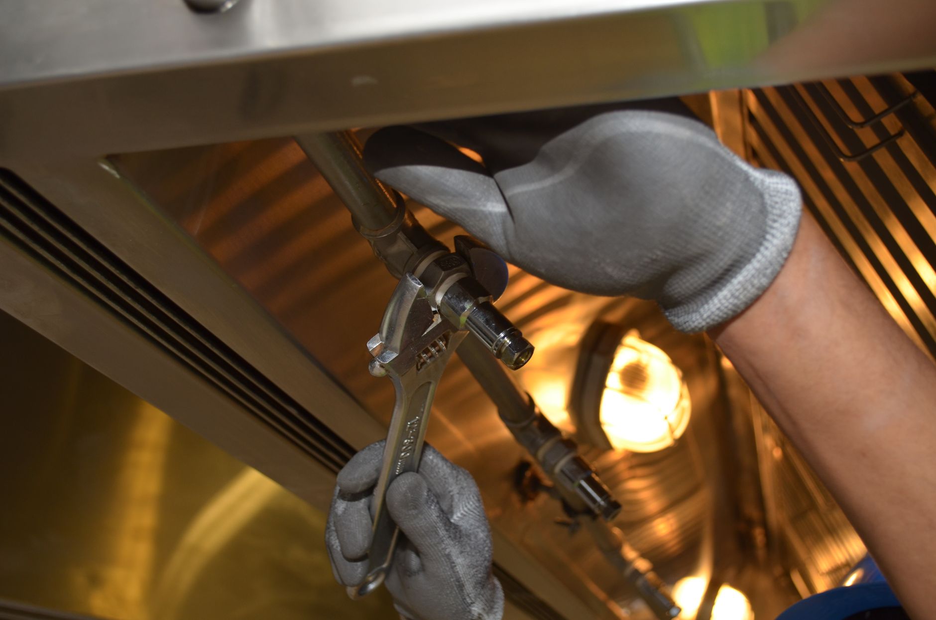 Maintenance technicians after scrubbing hours returned to equipment work.