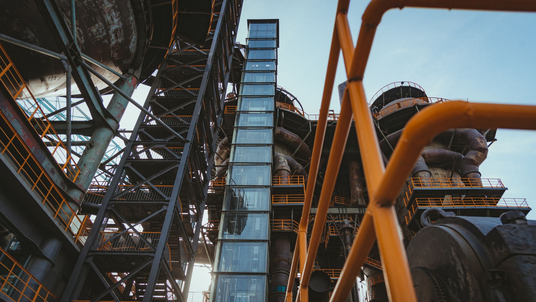 Industrial lift doors and freight access connect multiple production floors.