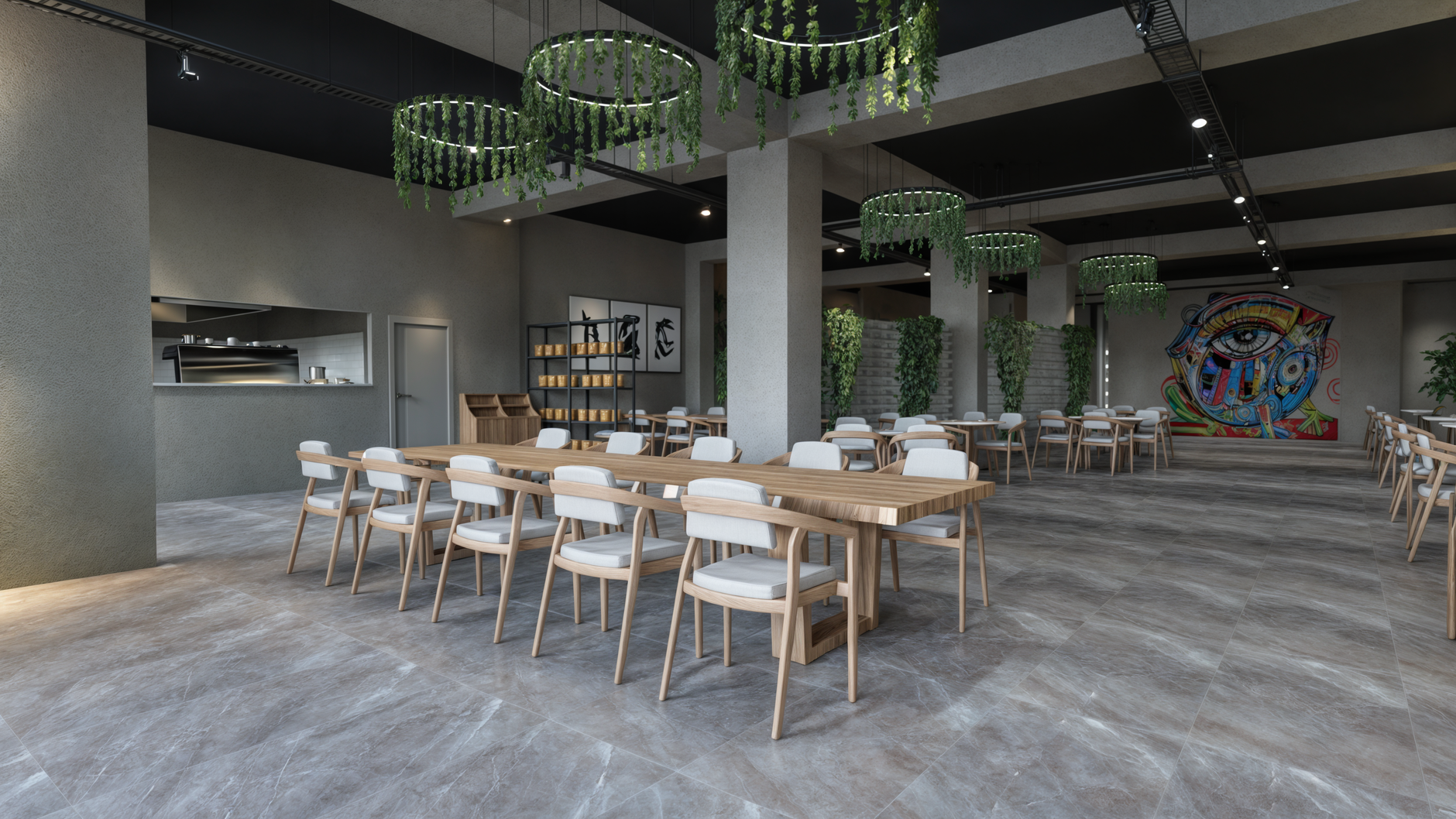 Large employee cafeteria inside an industrial campus with rows of tables and clear floor space for daily cleaning.