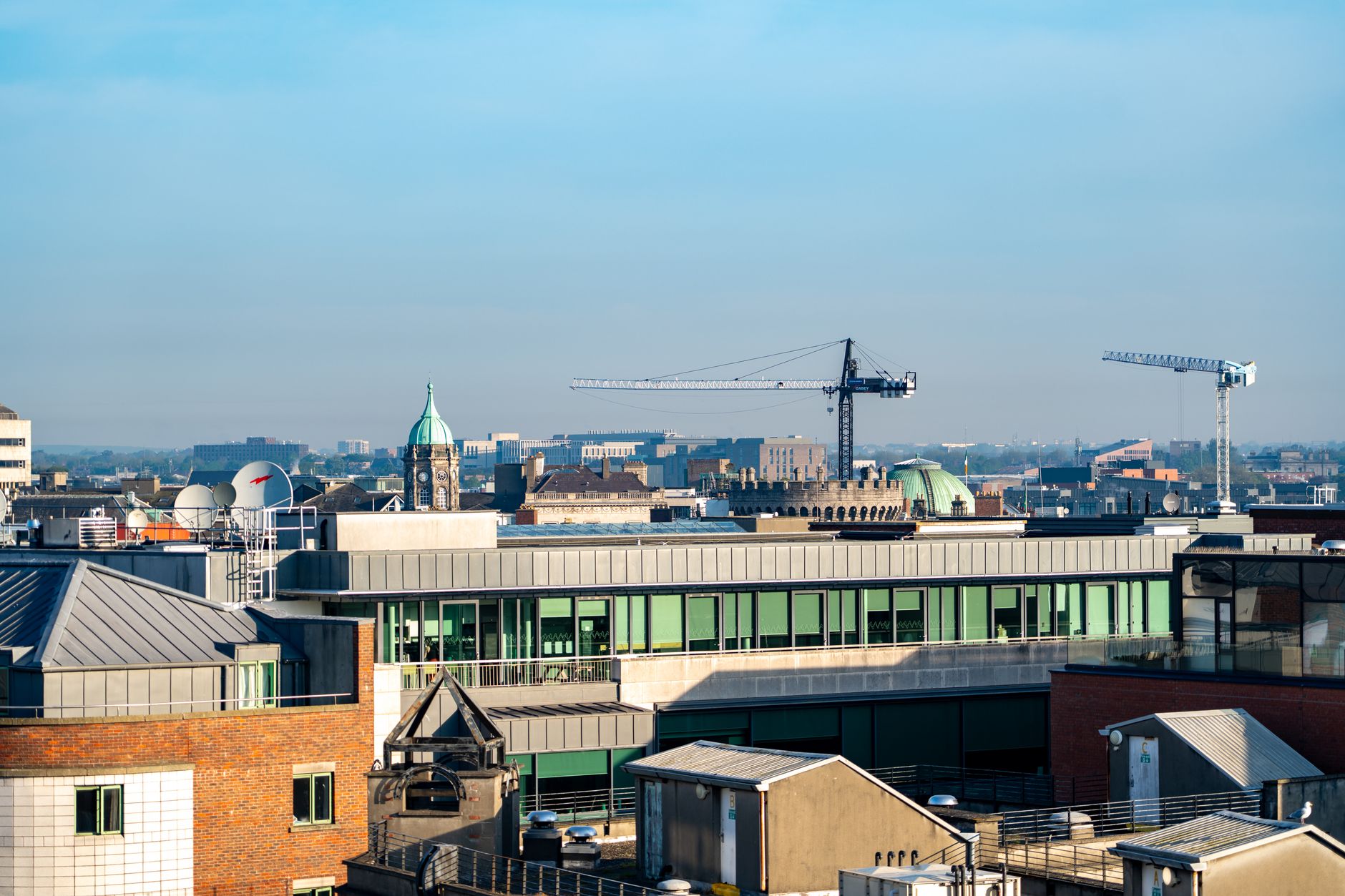 A commercial rooftop service area where teams would stage access and setup before a high-rise facade cleaning job.
