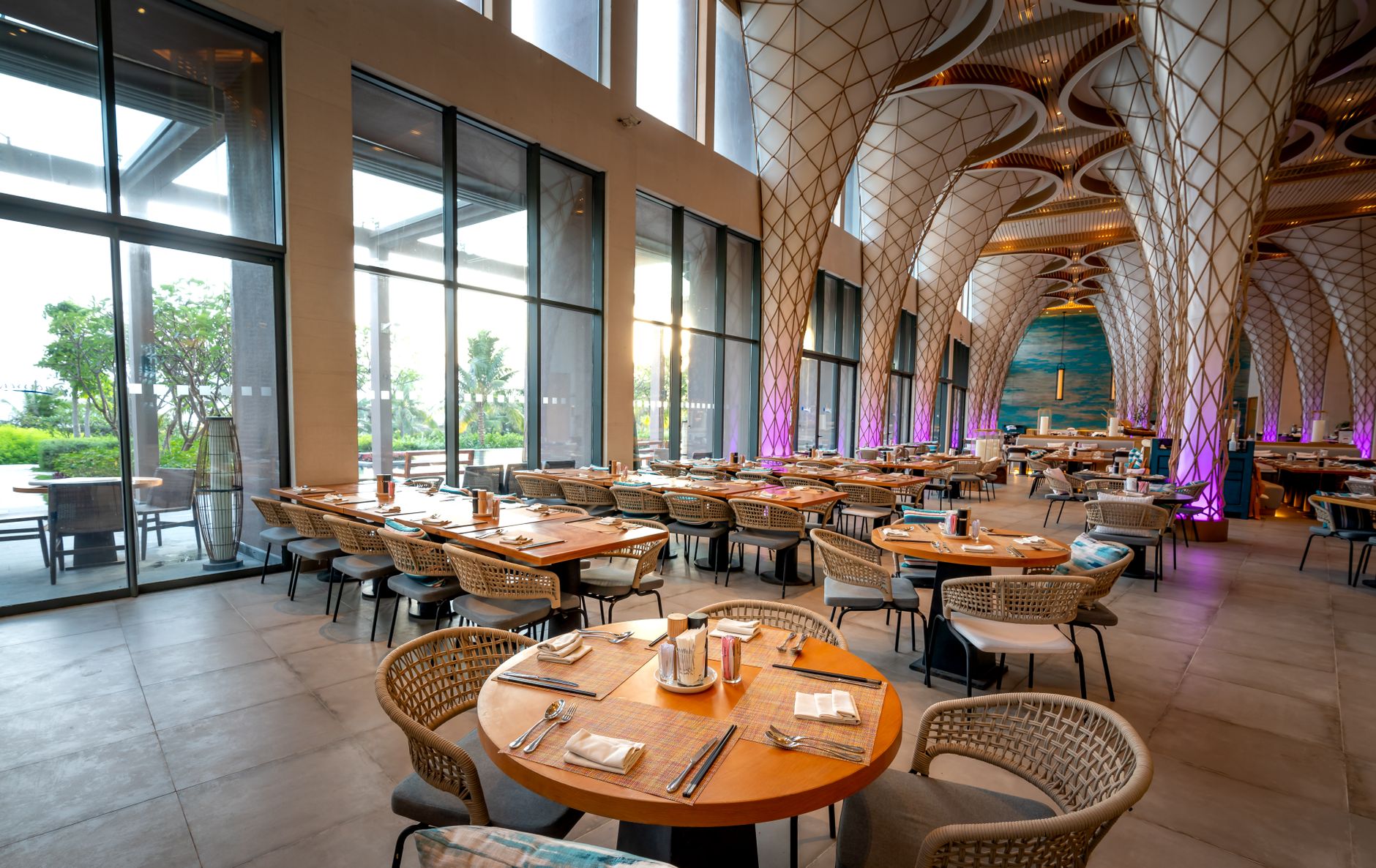 A spacious dining hall where wide floor plans push servers into long interior routes.