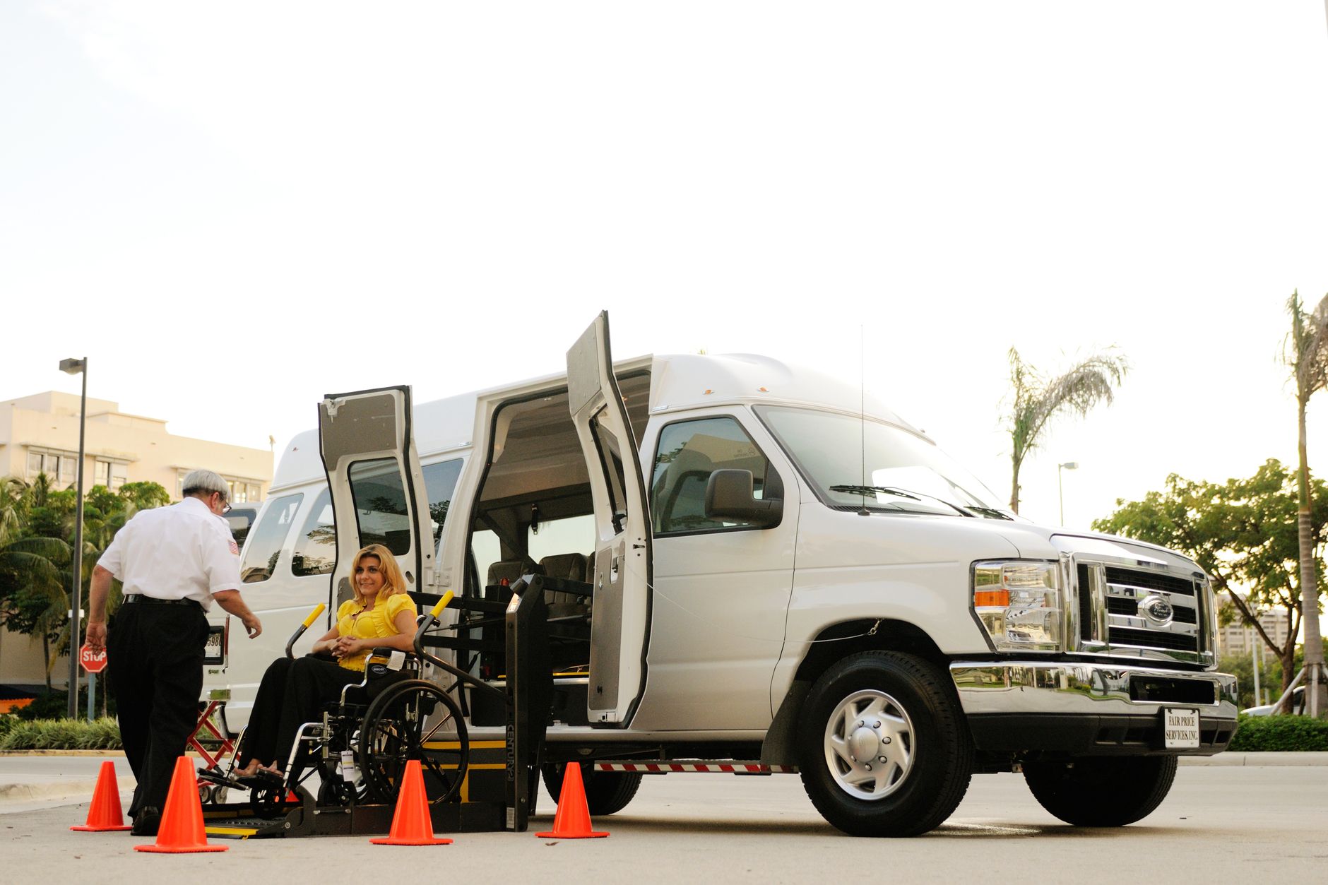 An airport traveler receives wheelchair assistance in a spacious terminal, illustrating the independence and customer-experience stakes of mobility support.