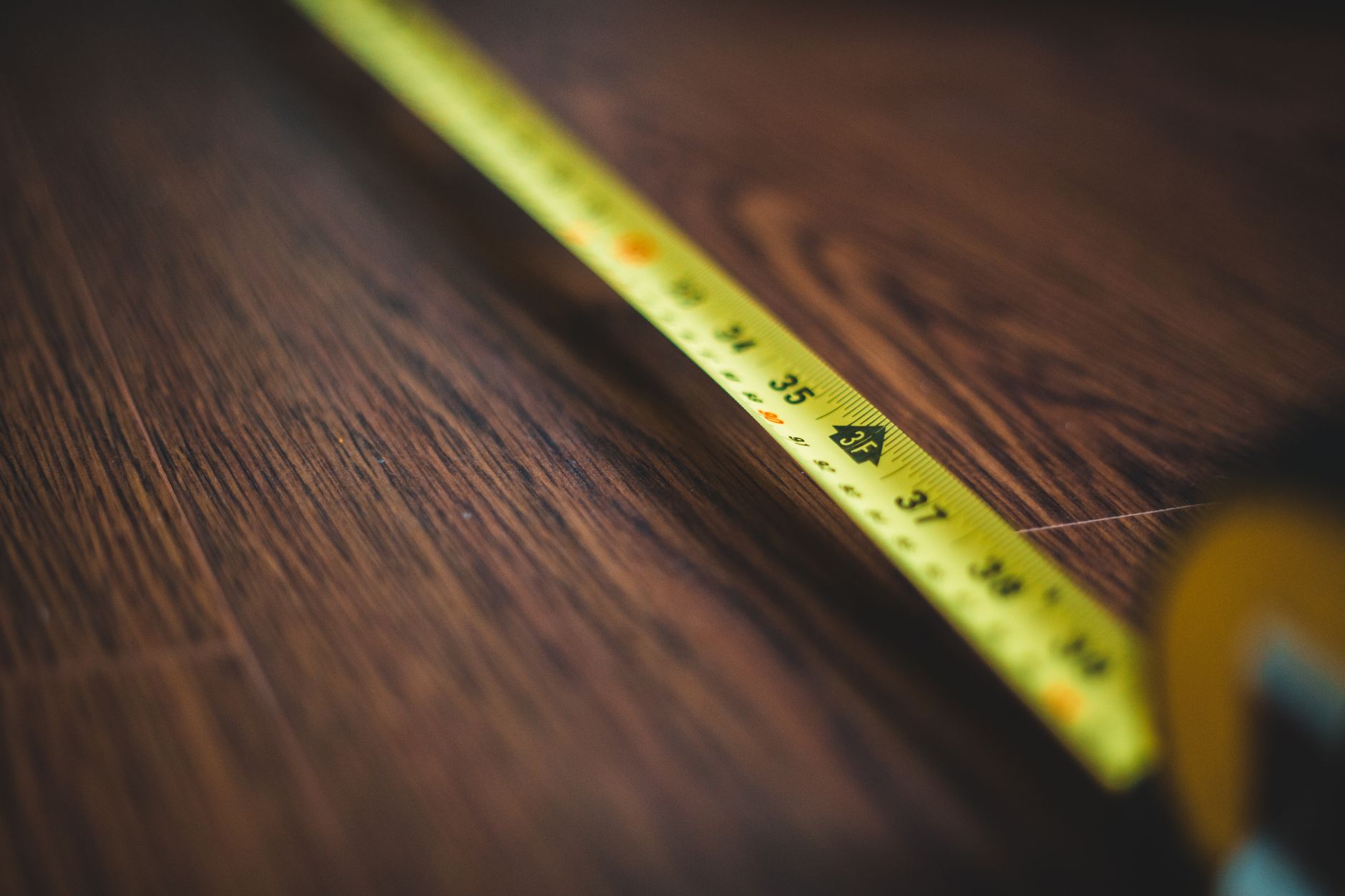 Trade markings on a concrete construction floor provide crews with a shared reference for installing building systems.