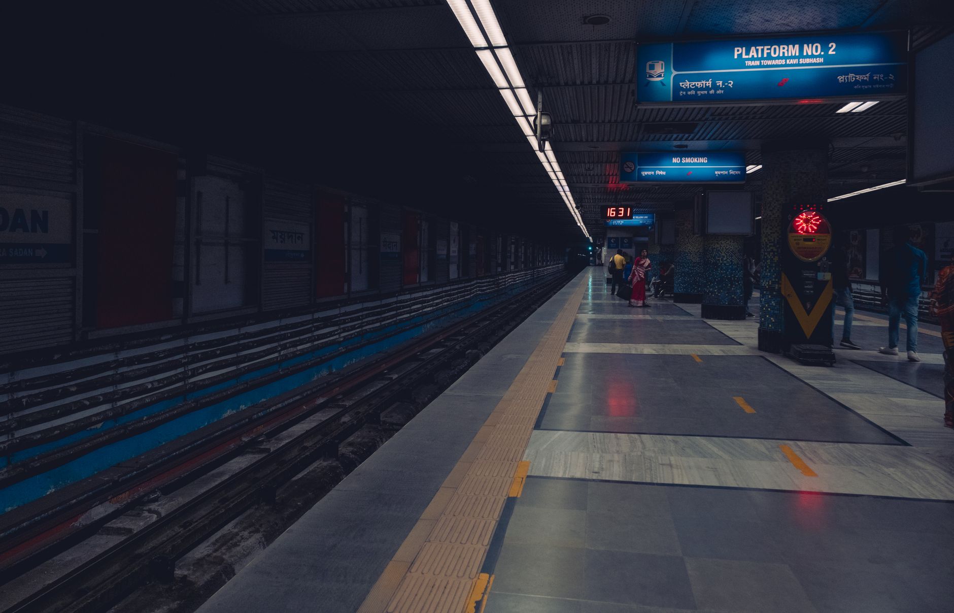 An empty rail platform provides a controlled window for overnight floor-care work.