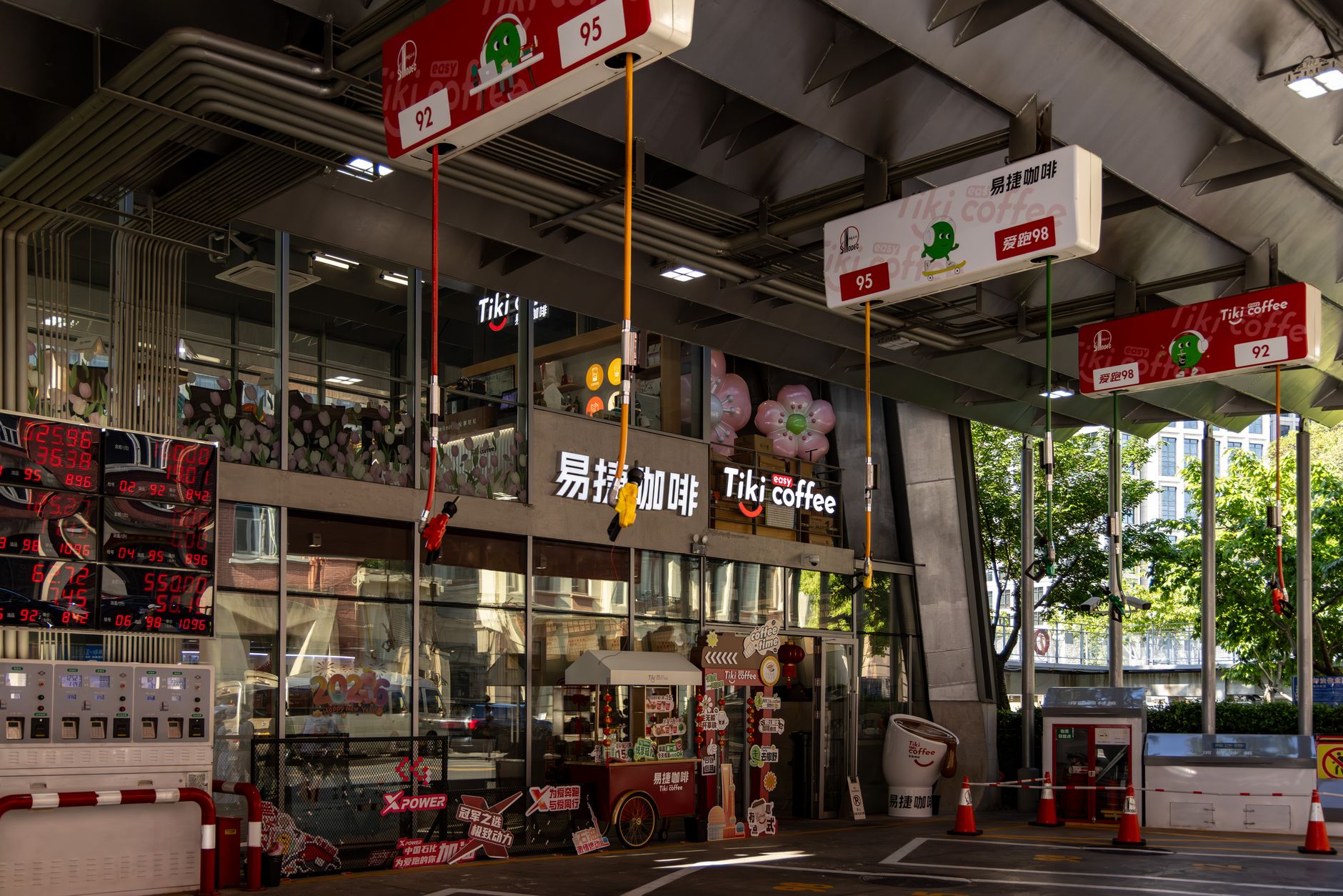 A self-service coffee and snack counter where store associates greet highway travelers.