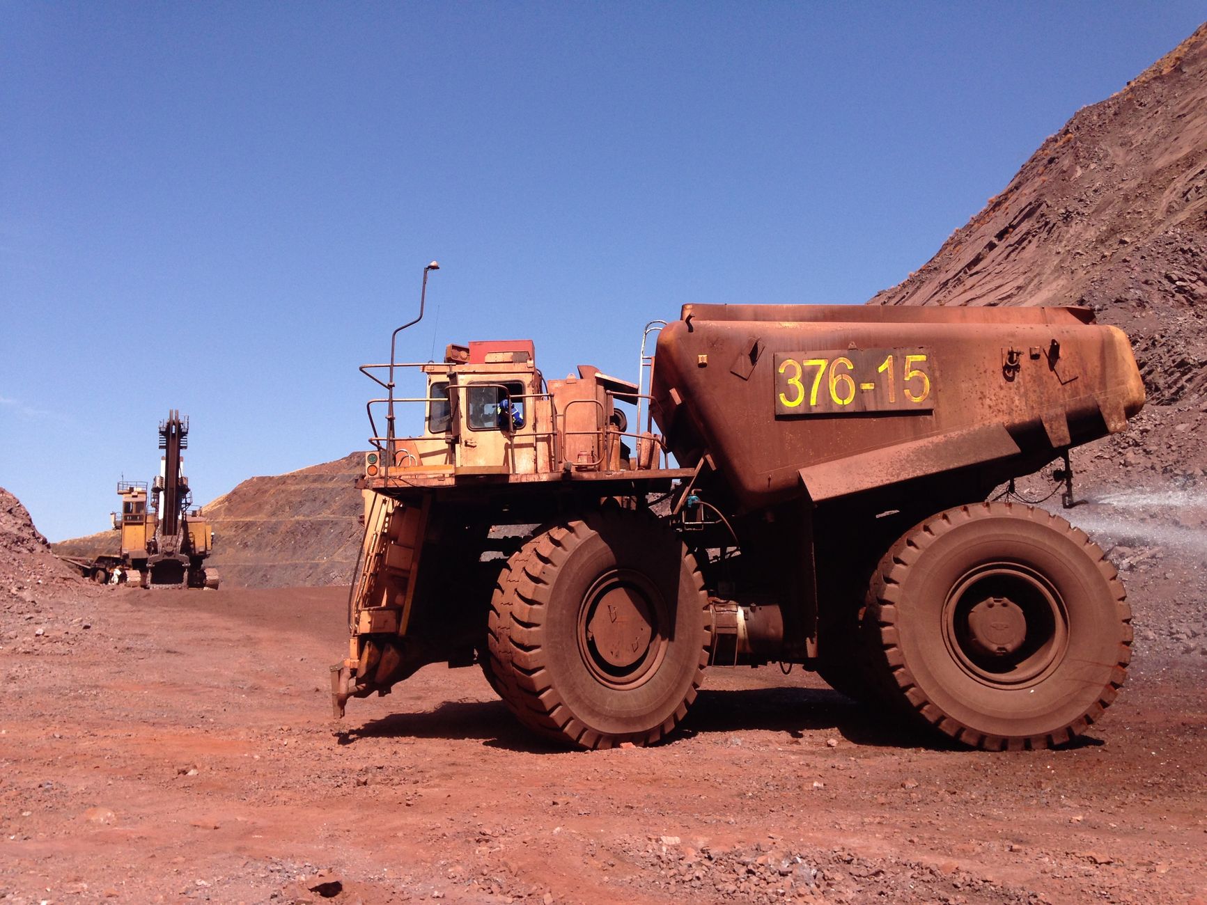 A bulk-material handling site like the fixed plant where transfer load out bins receive abrasive ore flow.