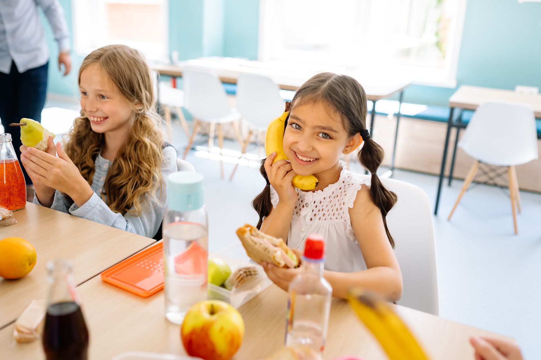 Students and staff move through a busy secondary school cafeteria where floor care must reset quickly between lunch periods.