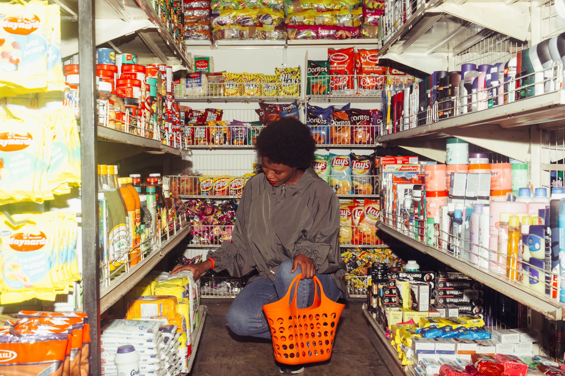 Grocery aisles where autonomous scrubbers run while associates serve customers.