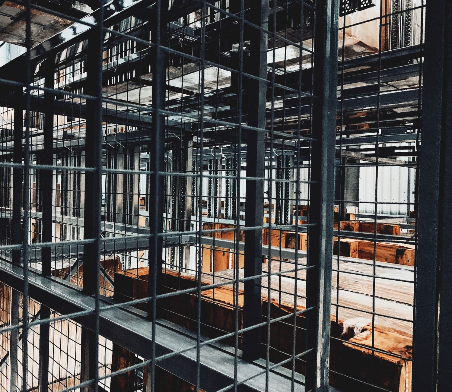 Metal structures inside a large industrial vessel where scaffold builds were once required.