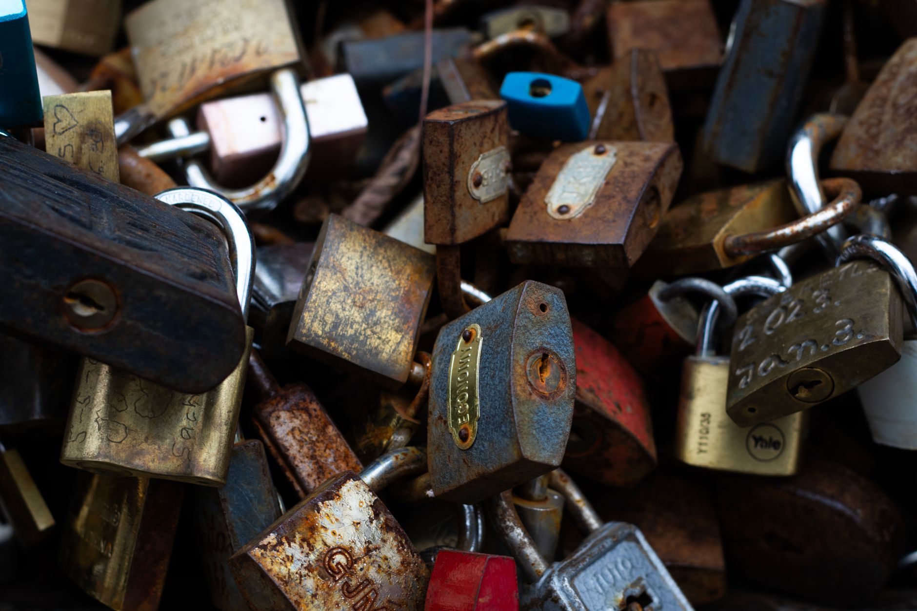 An assortment of polished brass padlocks representing the high-volume finishing work described in the case study.