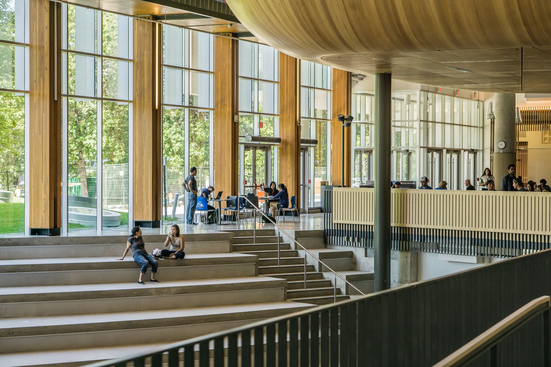 A spacious, polished university atrium prepared for daily campus traffic.