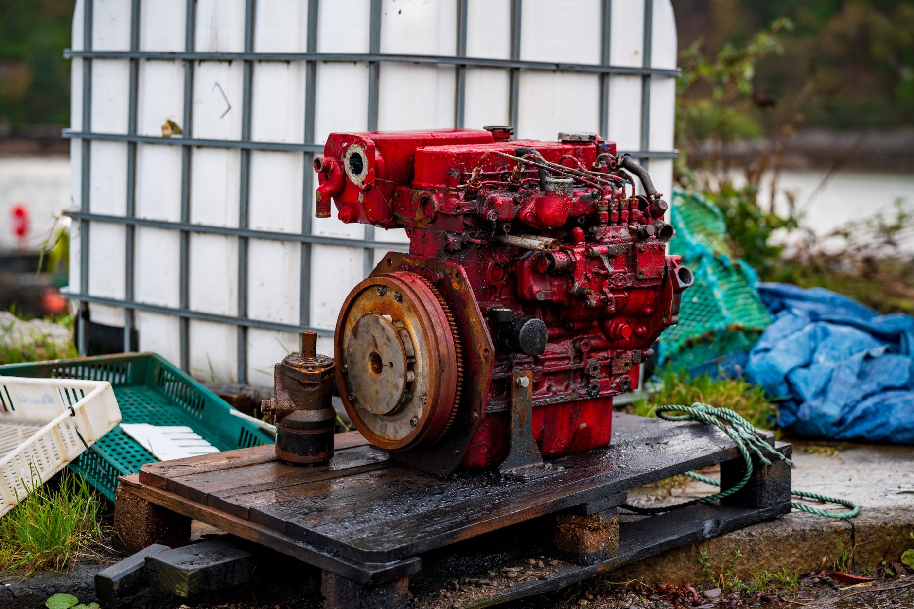 Palletized metal components staged after sintering and inspection.
