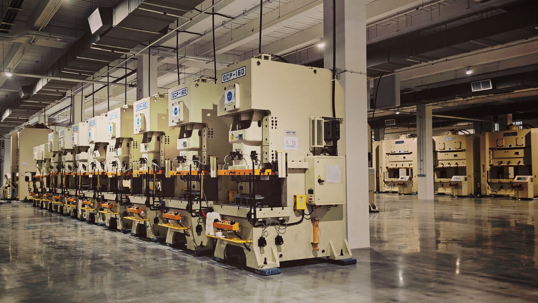 Industrial press area where delicate parts need careful handling