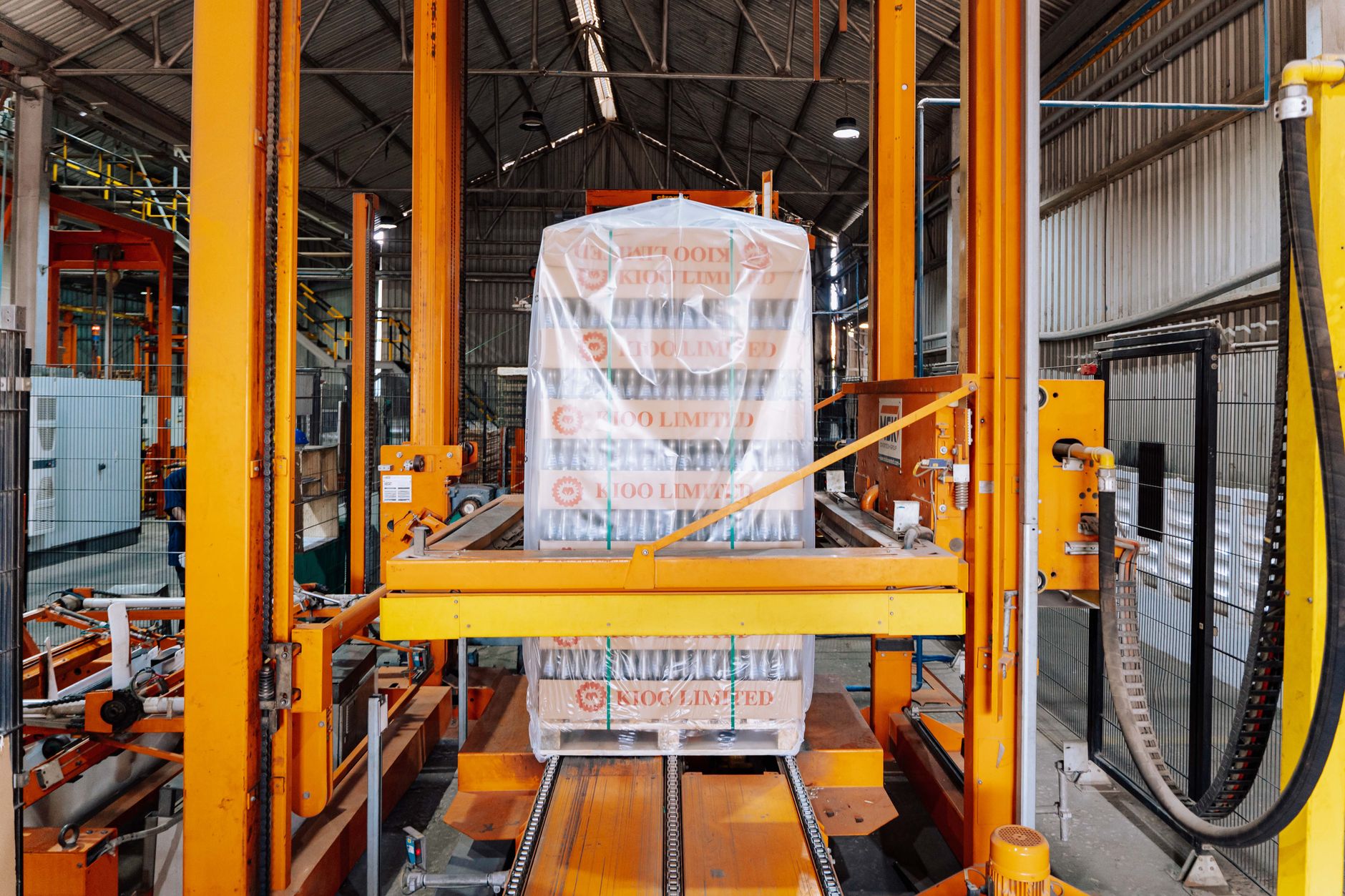 Packages move along conveyor lines in a fulfillment building.