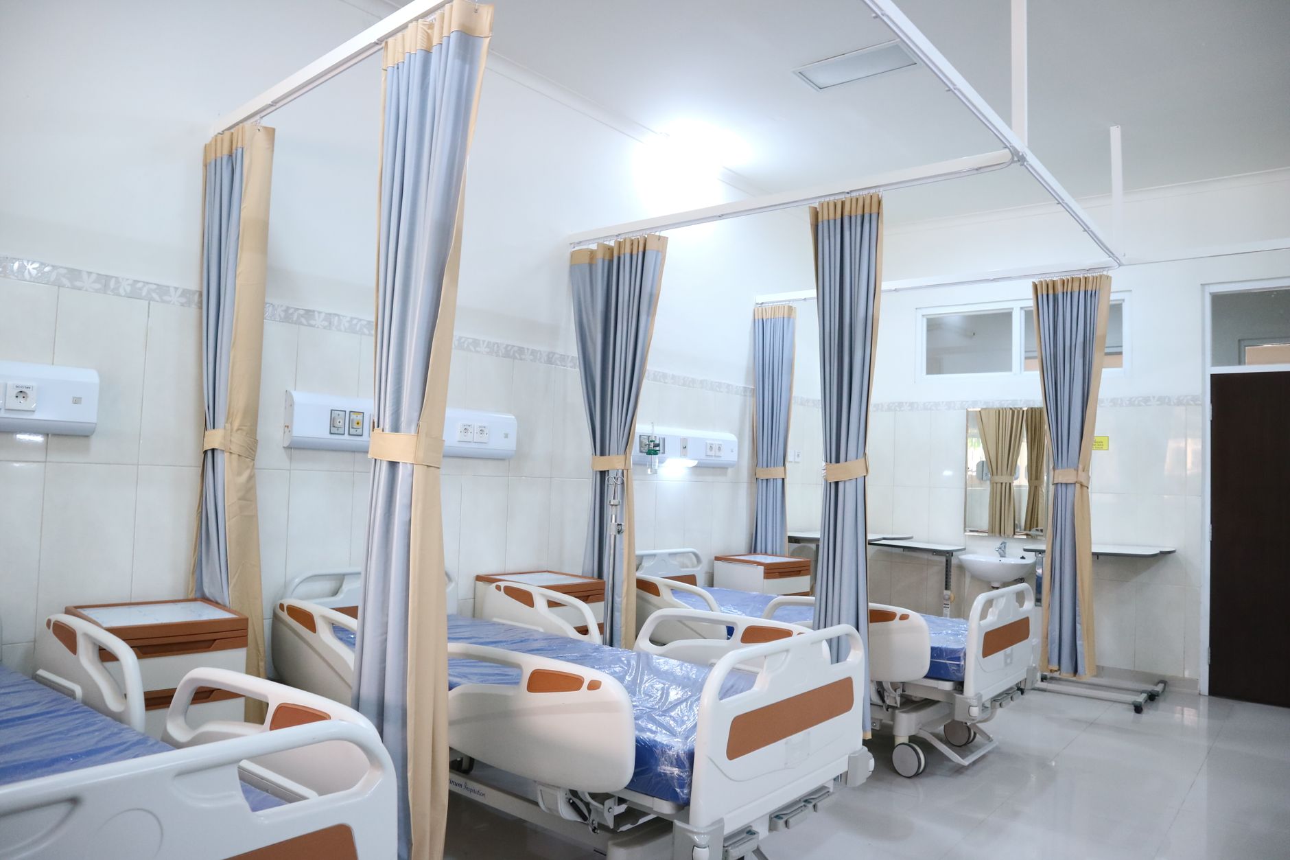 Busy hospital nursing station where staff coordinate patient care and internal supply requests.