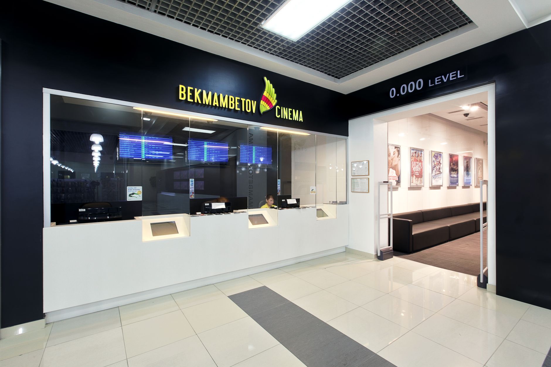A spacious movie theater lobby prepared for guests between showtimes.