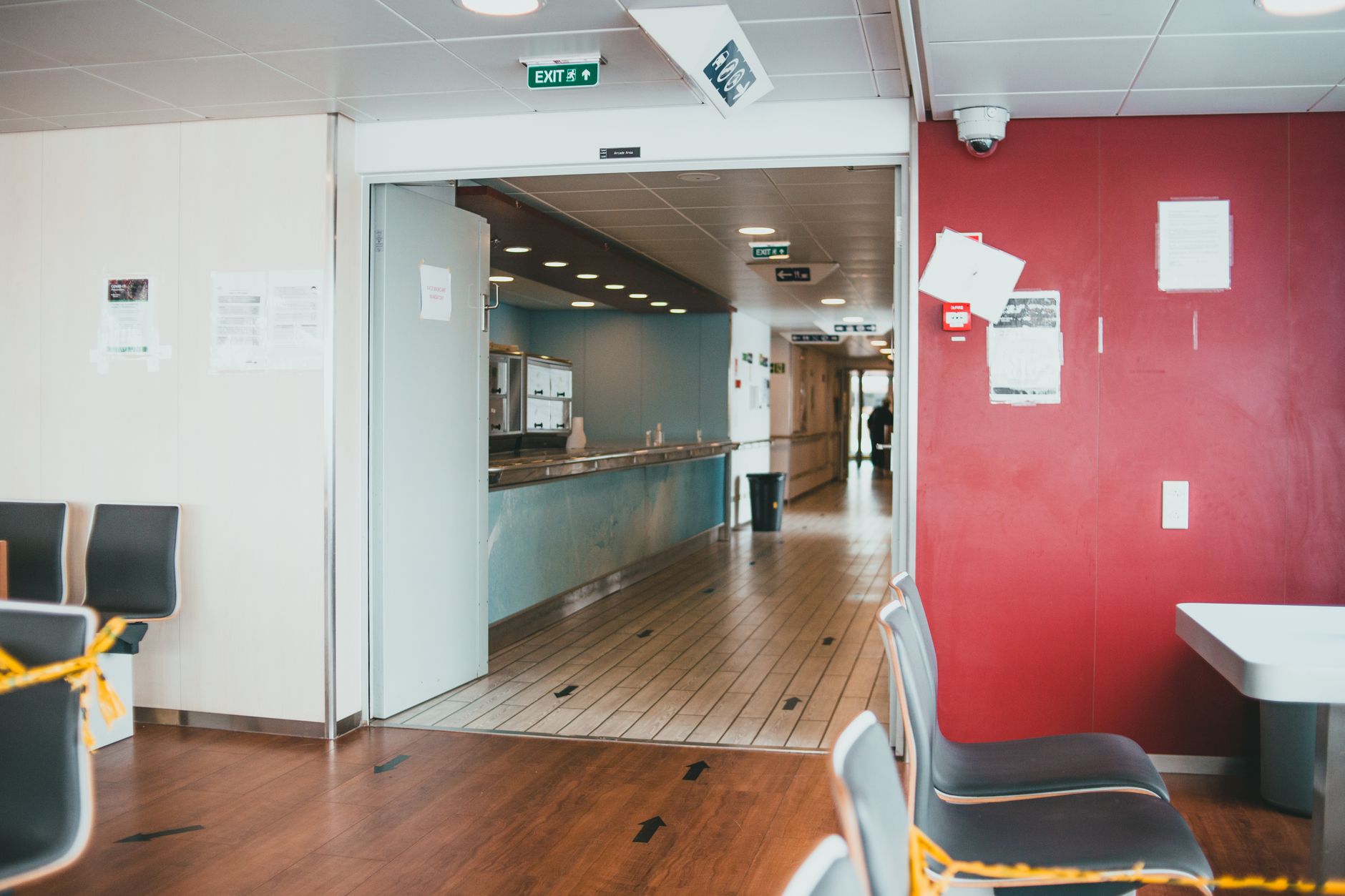 A clear doorway between a commercial kitchen and service area, reflecting the route conditions that made transport runs easy to standardize.