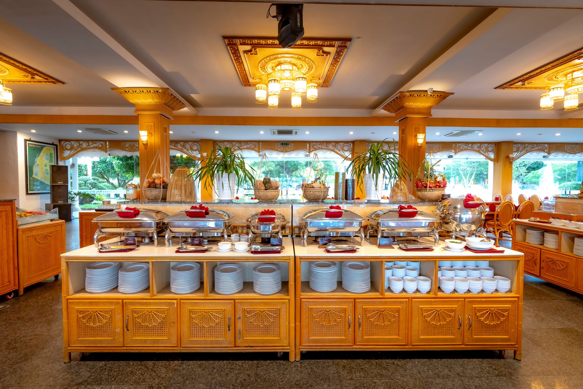 Wide view of an upscale resort buffet dining room that matches the busy guest-facing setting of the case study.