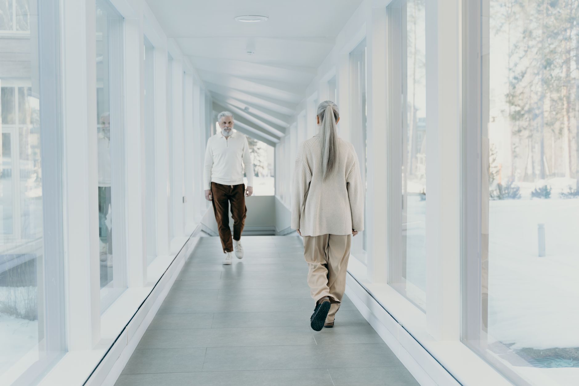A clean, well-lit corridor in a senior living community.