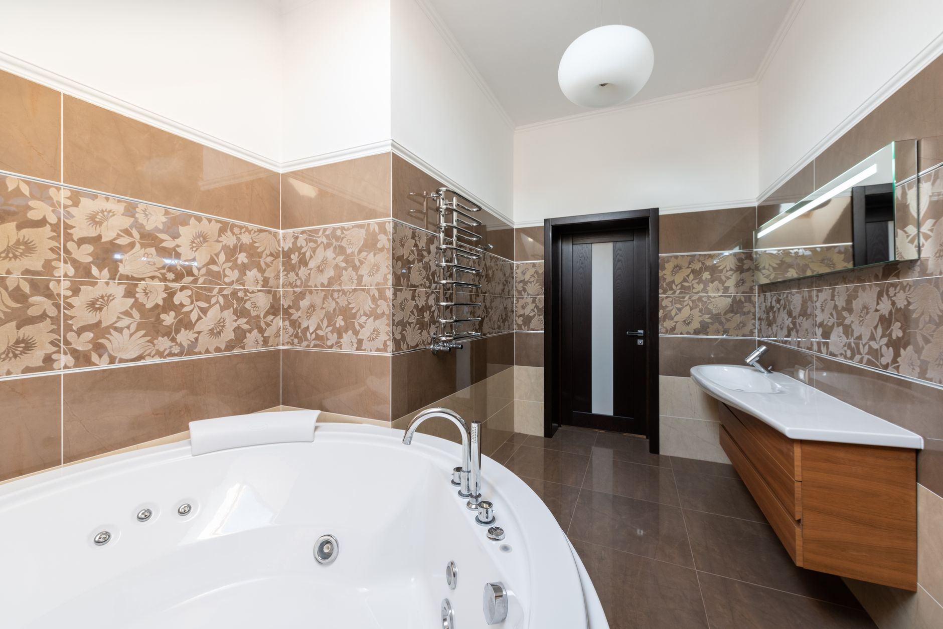 A bright bathroom interior evoking the sanitary-products market where toilet seats are sold.
