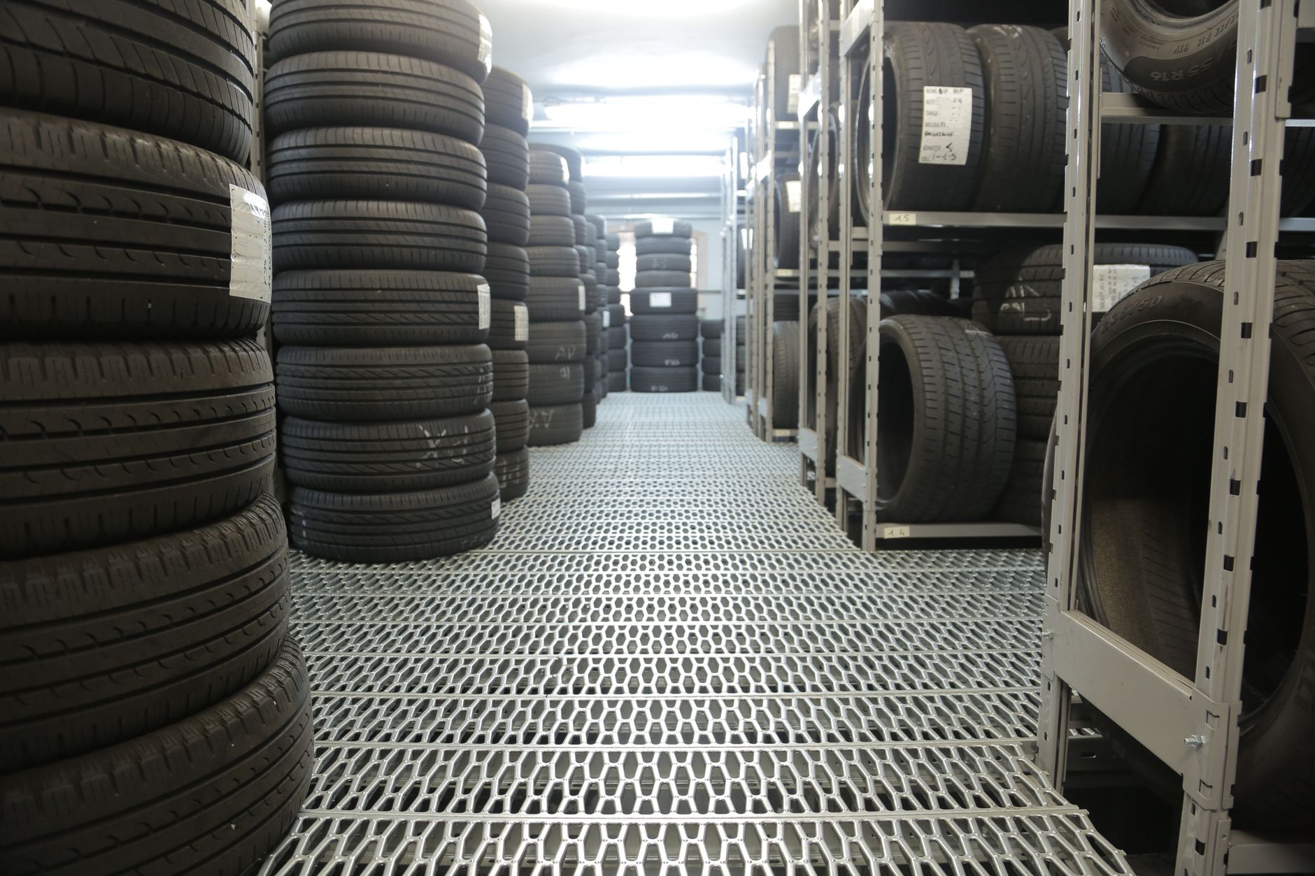 Tyre storage area feeding a reconditioning production line