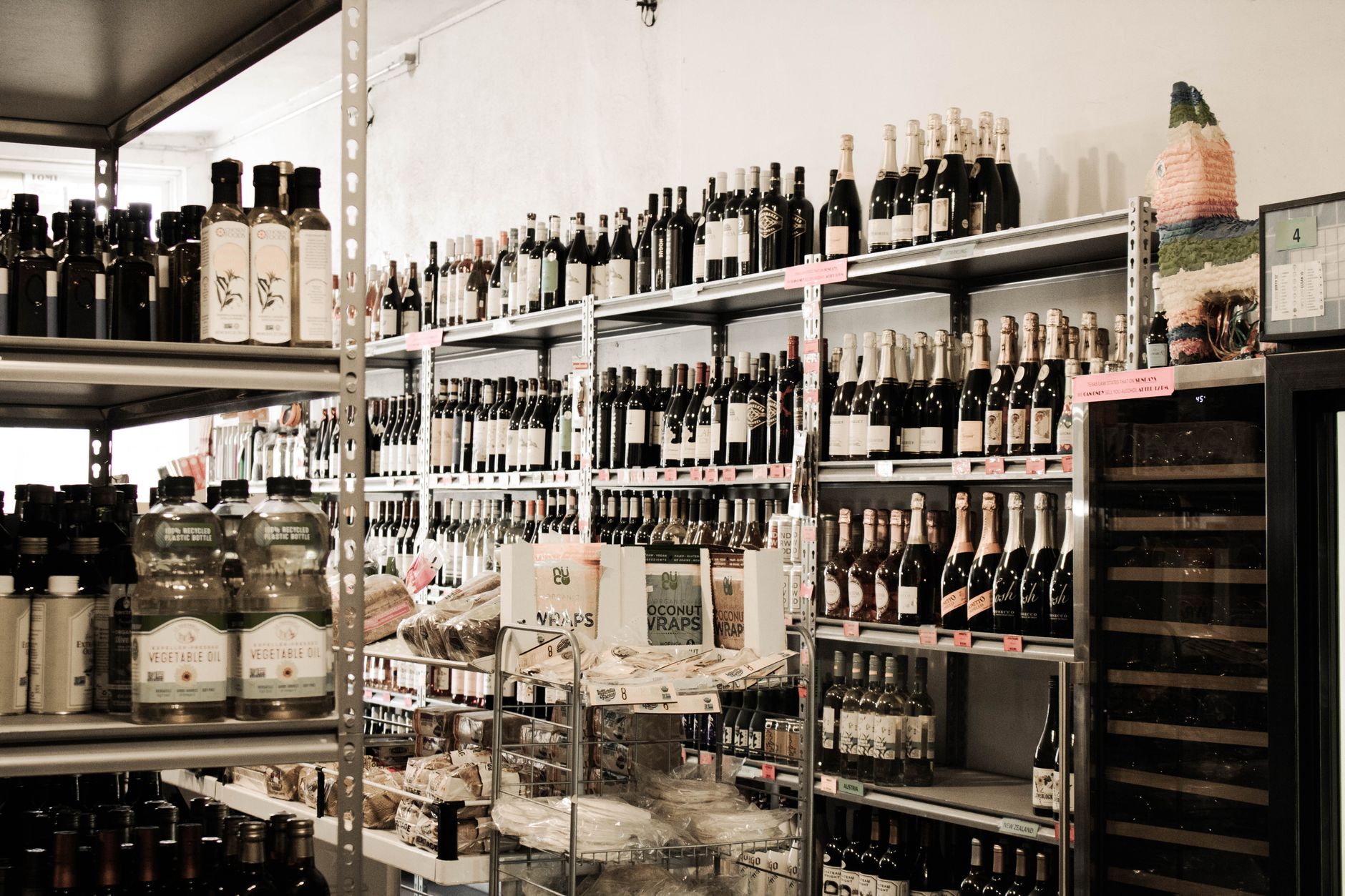Wine bottles being packed into cardboard cases during the winery packaging process.