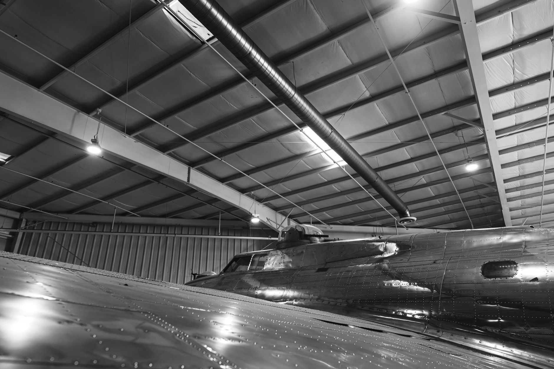 Close view of aircraft rivets where height and consistency matter on every joint.