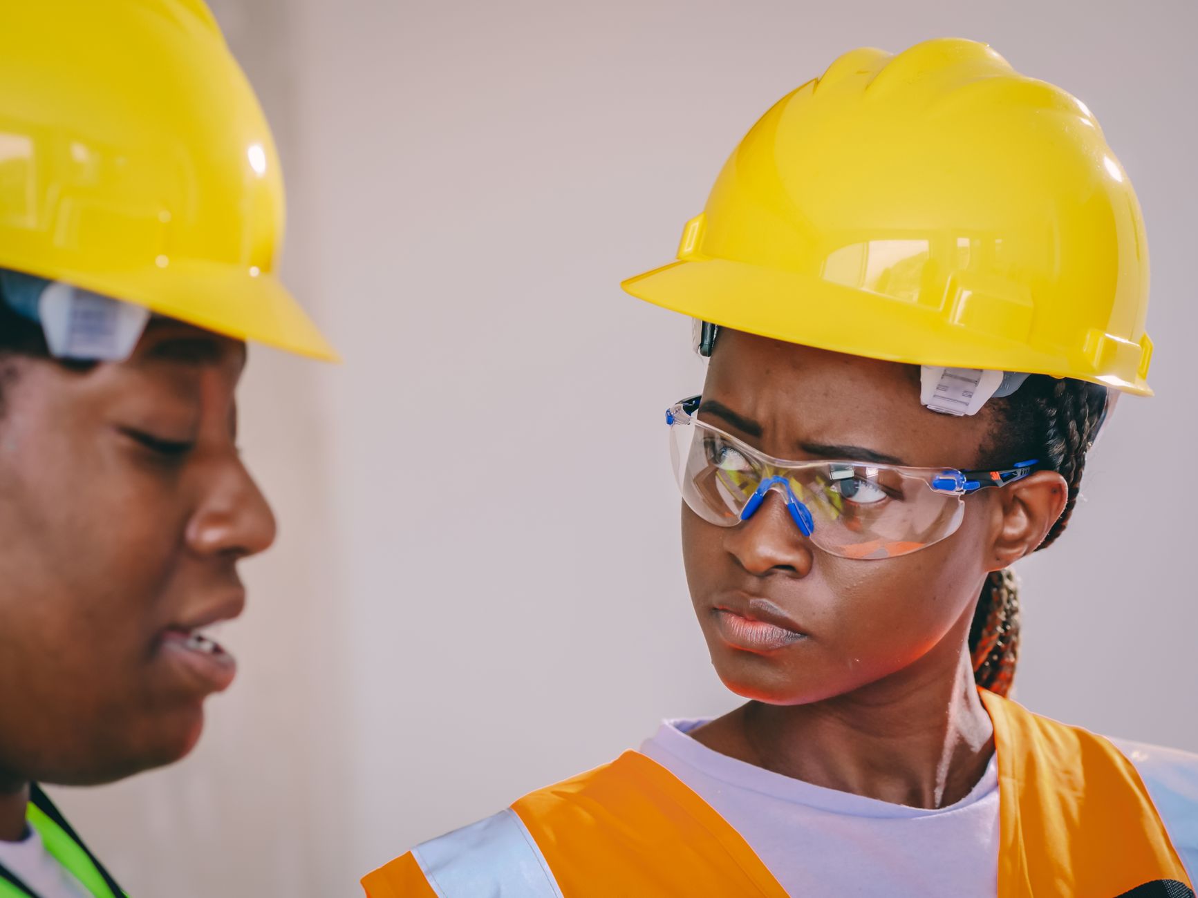 A field crew reviewing site plans together before beginning work.