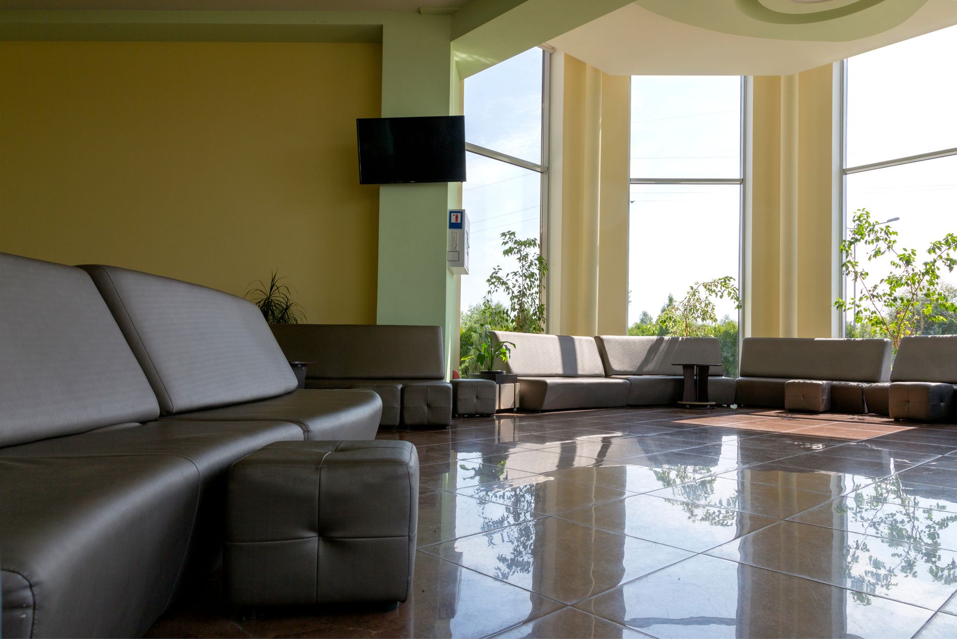 A hospital lobby where presentation standards depend on consistent floor care.