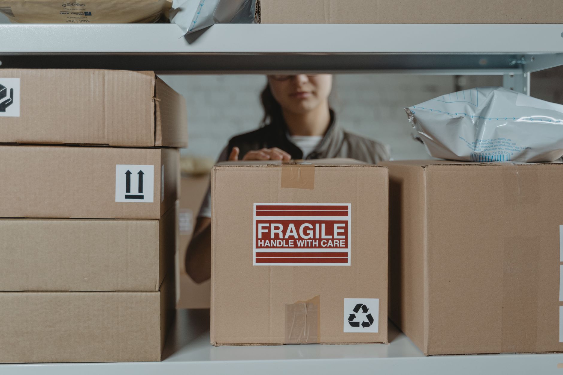 Outbound parcels staged after higher-accuracy picking at the wall.