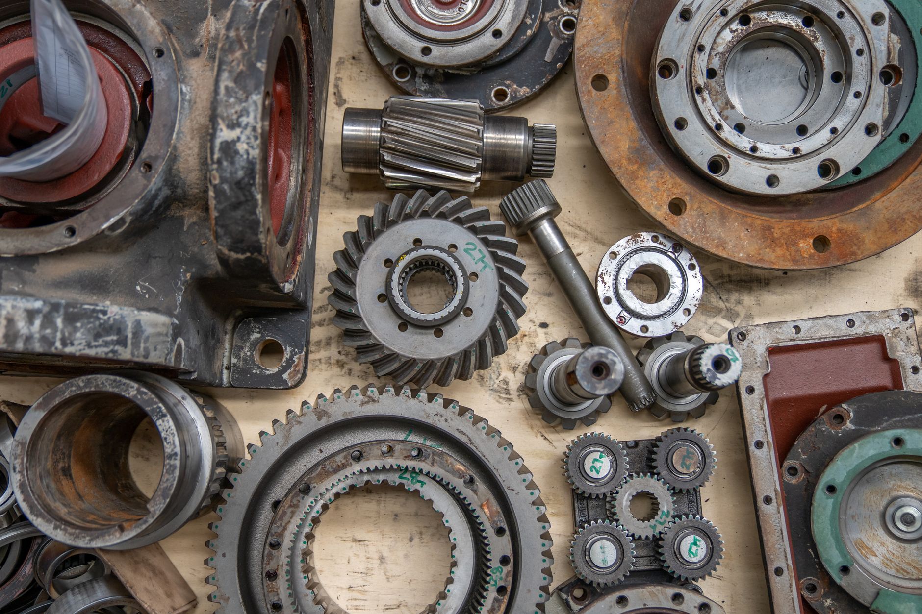 Component carts wait staged beside a production line.