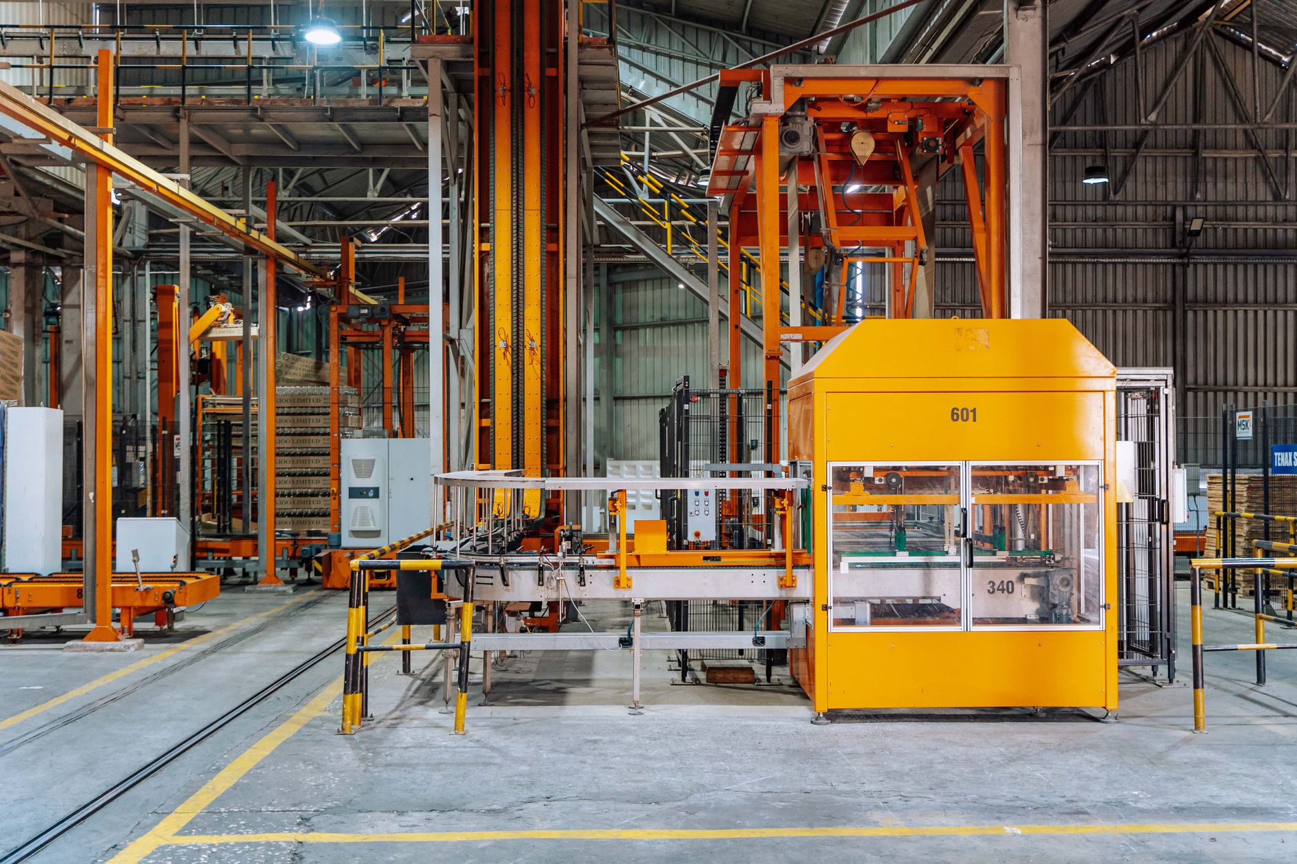 Automotive components move along a conveyor in a clean manufacturing line similar to the steady production environment described in this case study.
