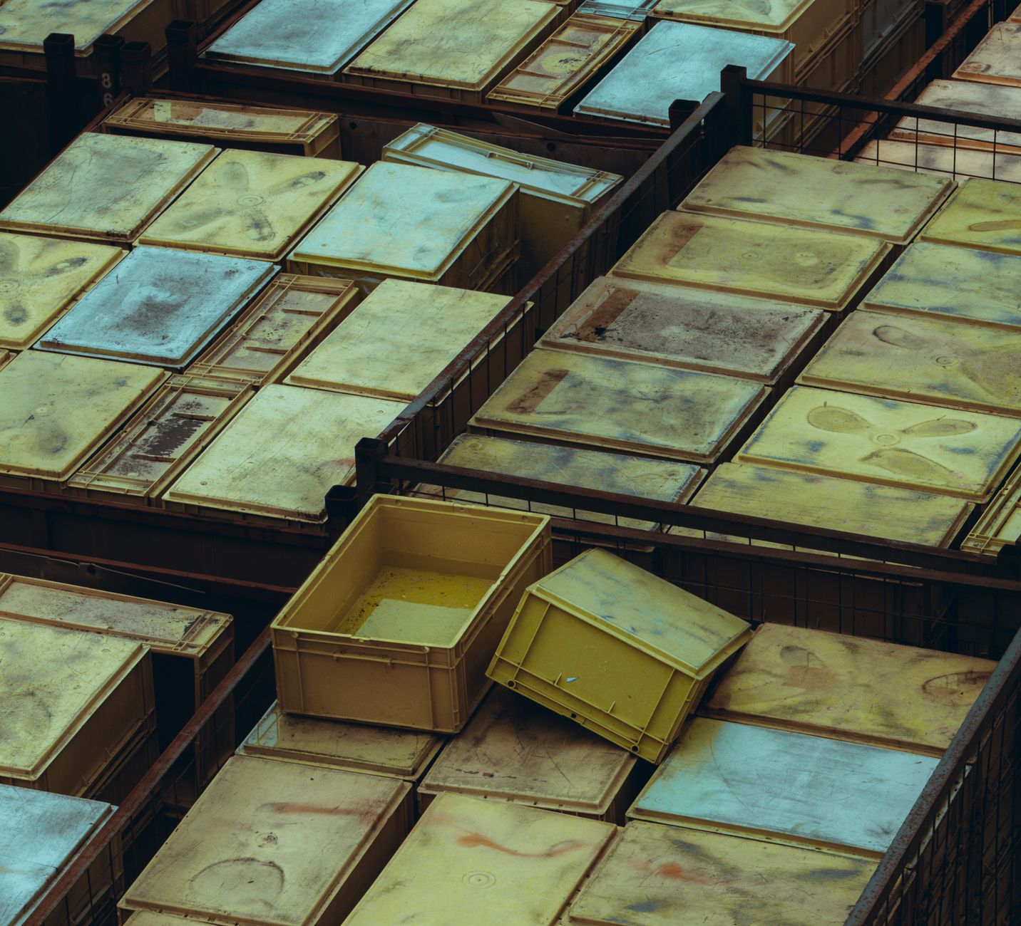 A pick wall where workers sort into order bins while inventory travels to the station.