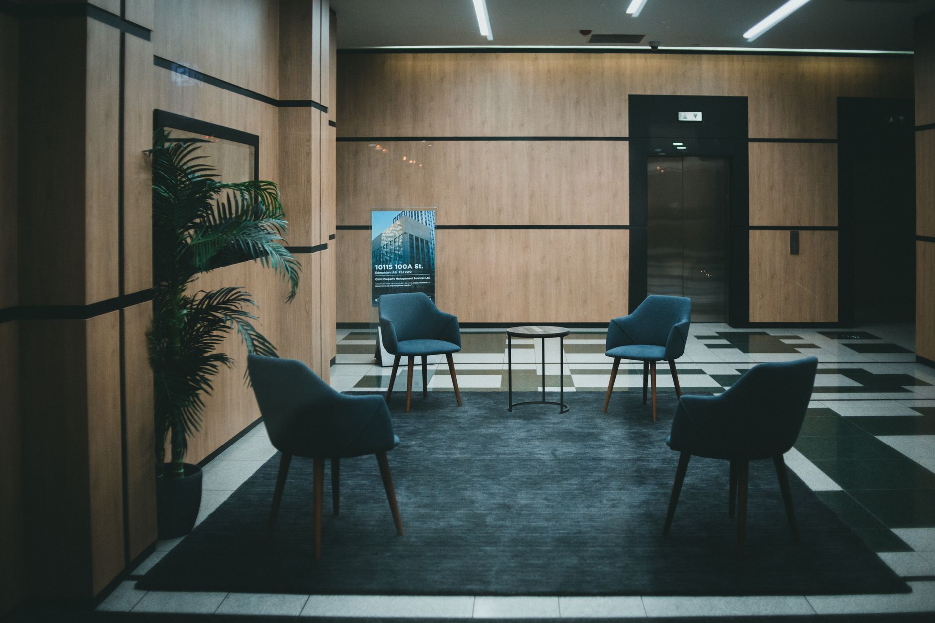 Corporate office lobby seating area where tenant-facing carpet quality matters to visitors.