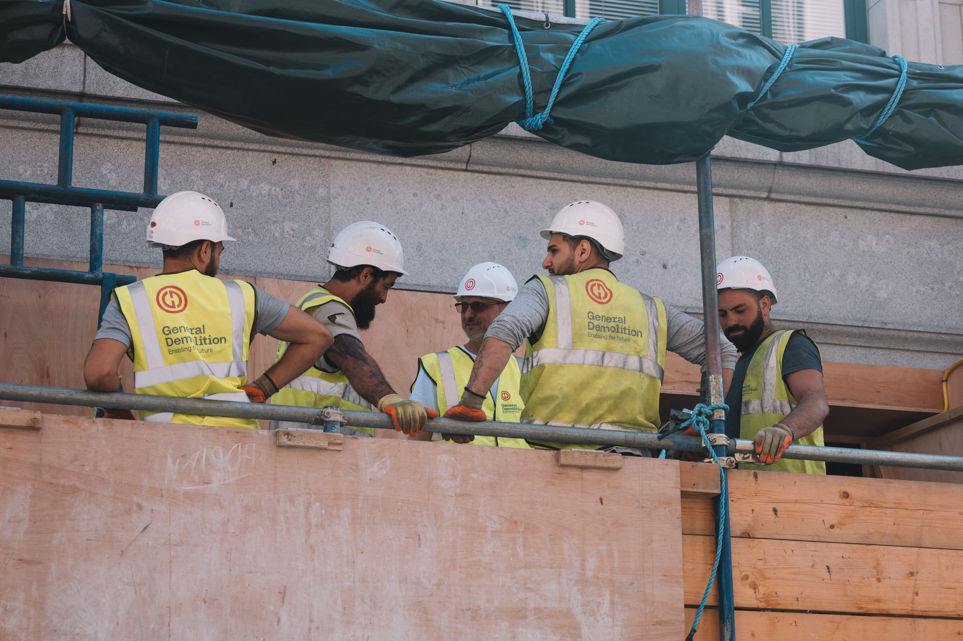 A small rigging crew coordinating a heavy move after crew size dropped from six planners to two operators.