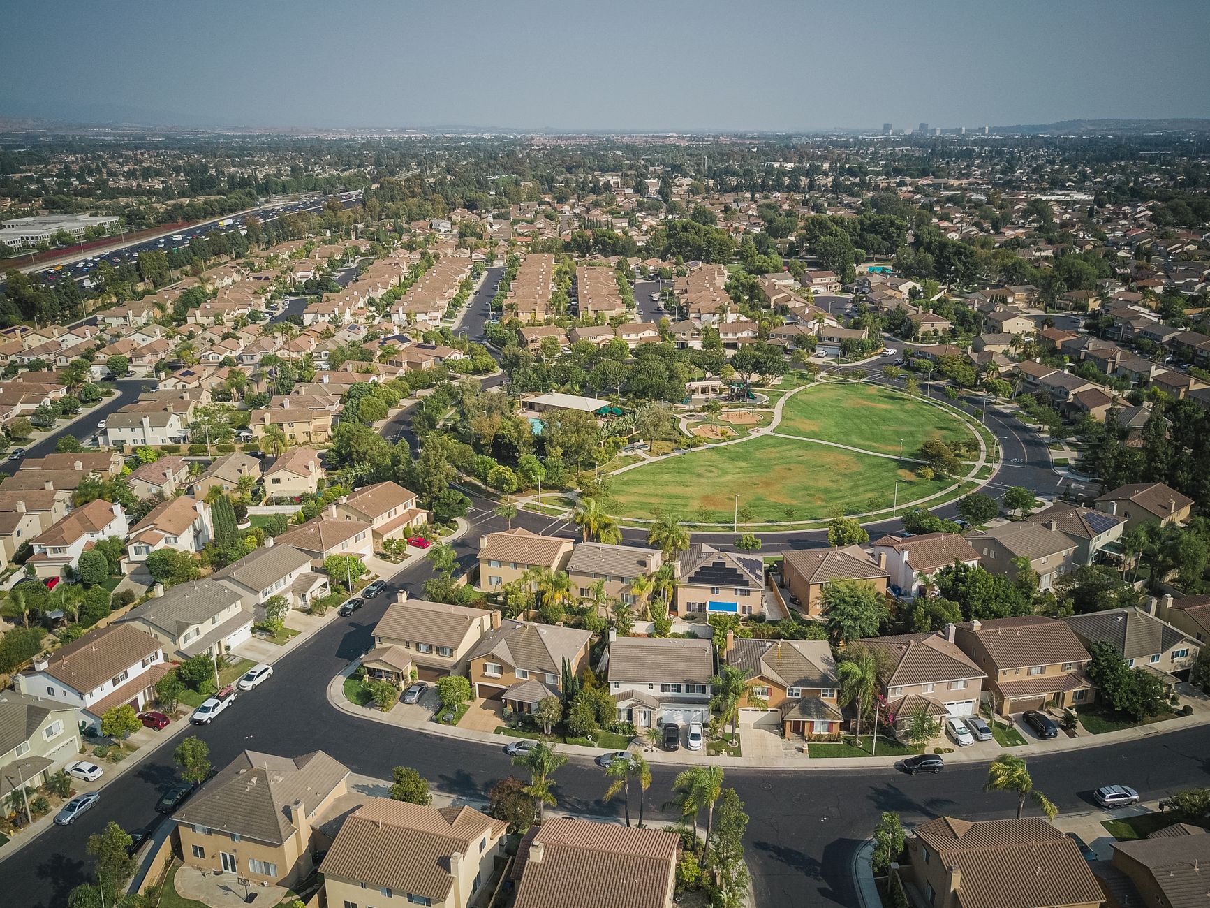 Aerial view of a suburban neighborhood representing the communities Amazon plans to add to its delivery network.