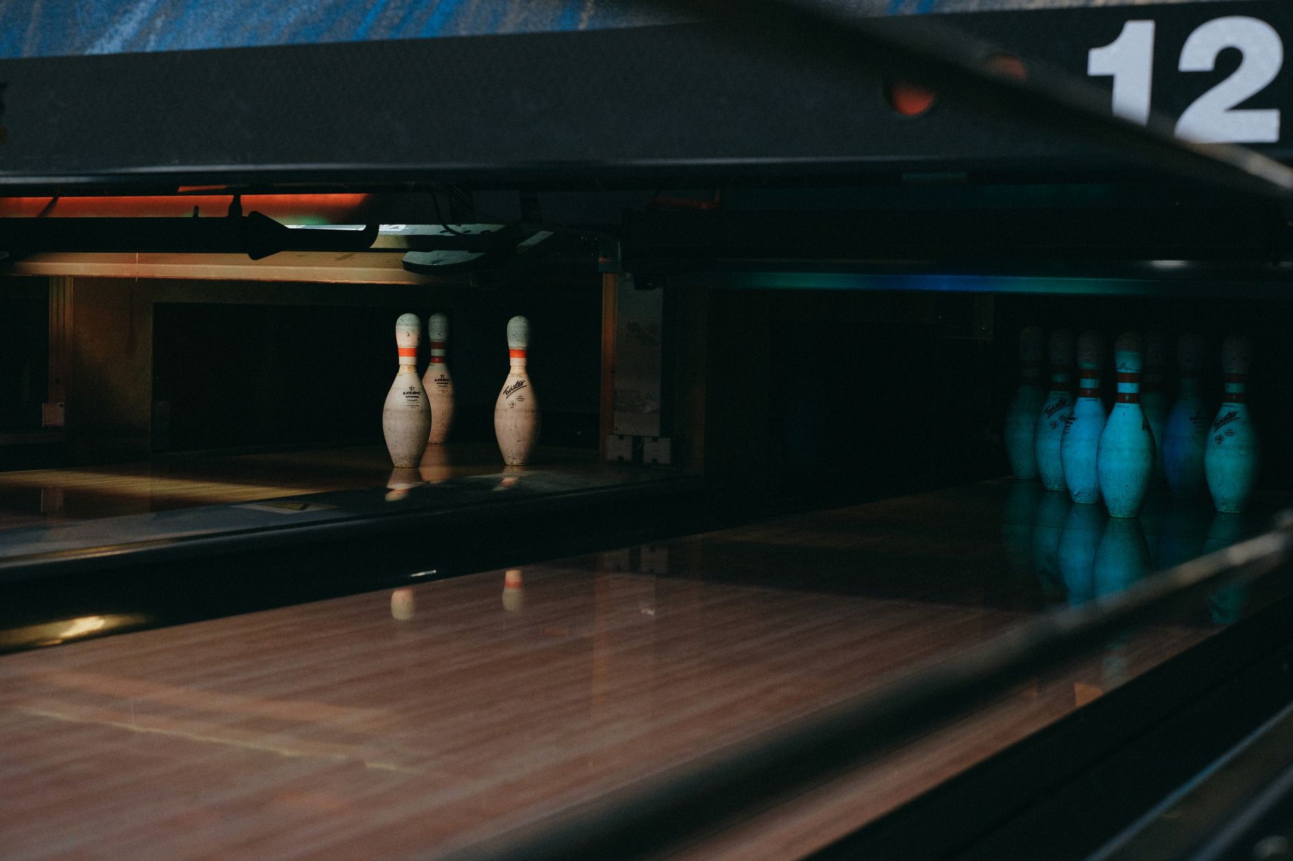 Empty bowling lanes and seating area before guests arrive for league night.